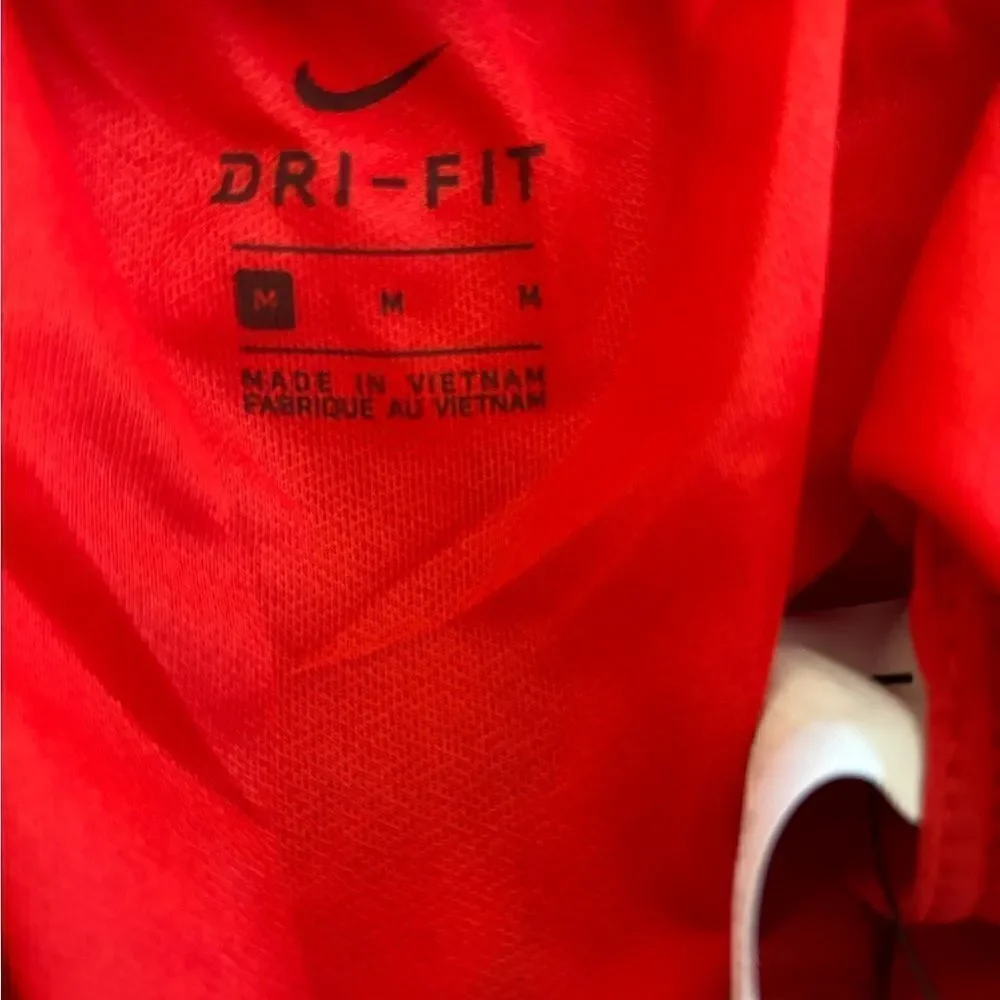 Nike gold running shorts with underwear lining